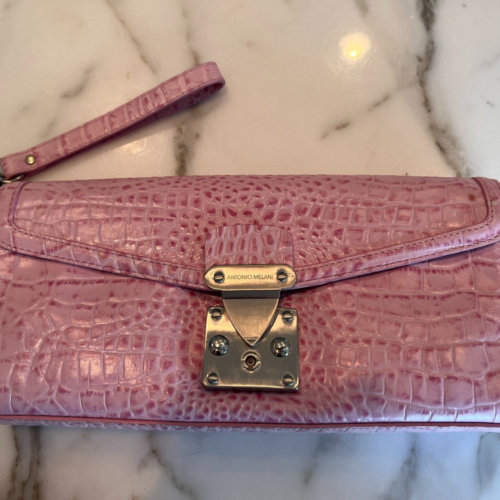 Pink crocodile embossed clutch